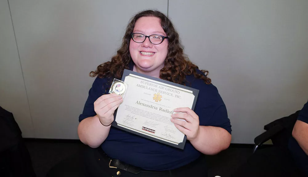 Superior Ambulance EMS Challenge Coin Recipient Alexandria Radloff