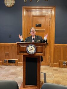 Jan standing behind a podium during the AAA Star of Life celebration