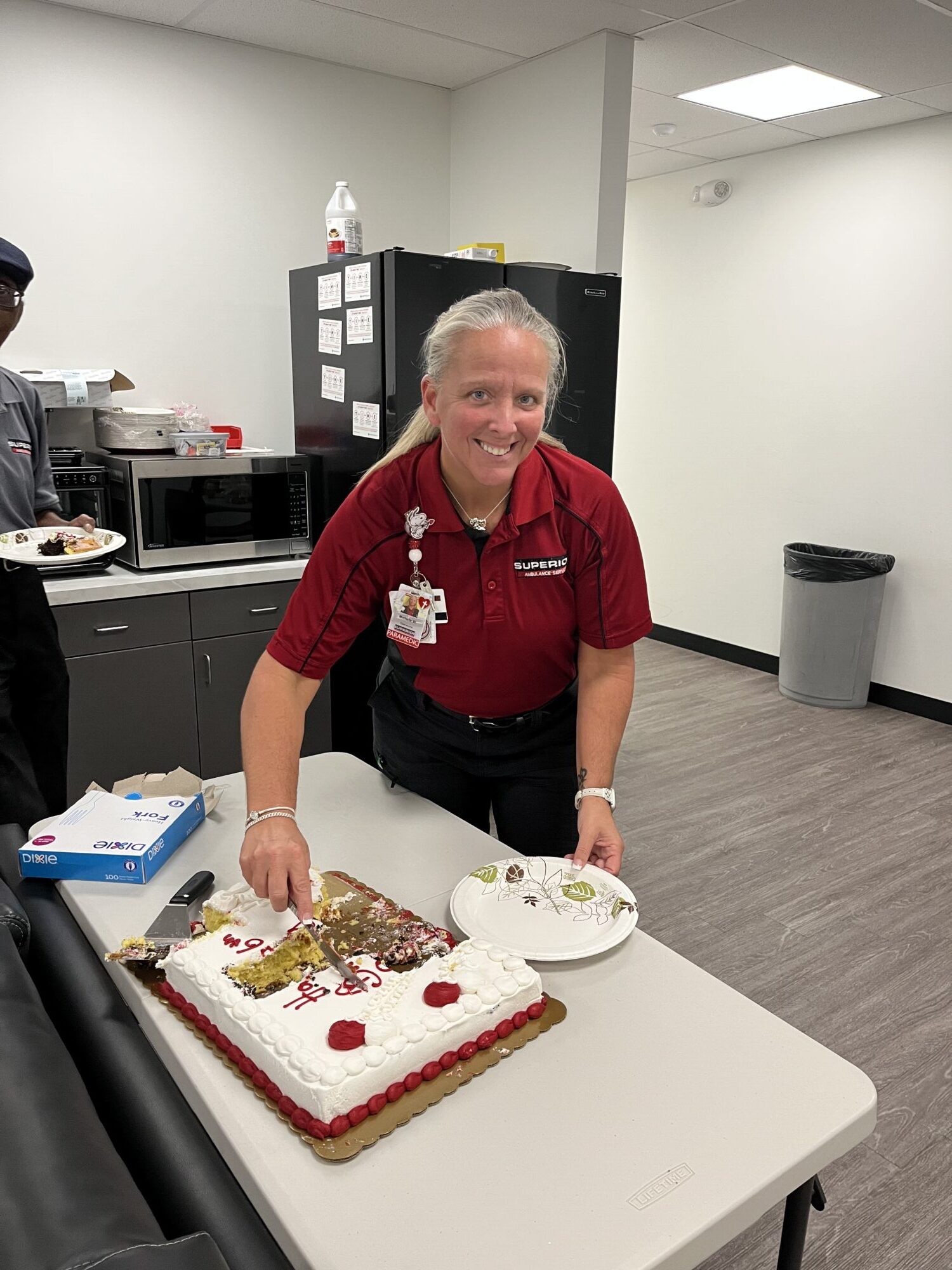 Ohio team celebrating Superior's 66th anniversary with cake