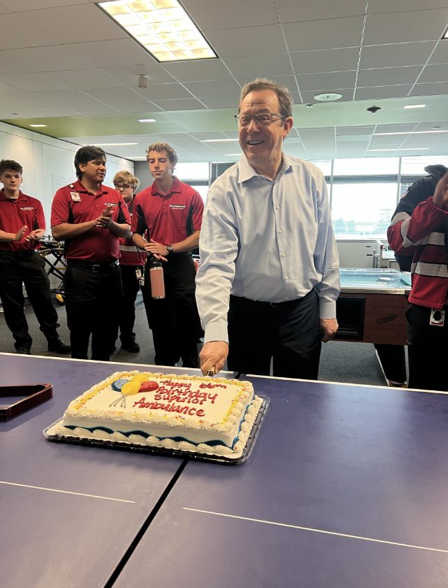 Superior's CEO cuts the cake